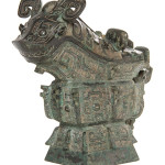 Chinese bronze ritual gong vessel having a fitted cover depicting a horned beast. Price realized: $722,500. Leslie Hindman Auctioneers image.
