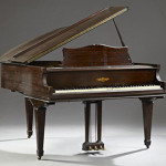 This Chickering mahogany baby grand piano, circa 1934, together with a mahogany music bench, sold for $500 at an auction in New Orleans last year. Image courtesy of LiveAuctioneers.com archive and Crescent City Auction Gallery.