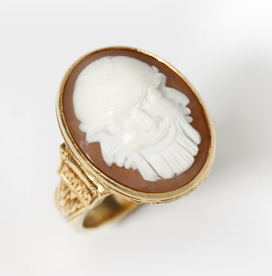 This antique cameo ring, carved as an intriguing triple-faced mask, exceeded expectations, selling for $1,680, well over the estimated $600-$800. John Moran Auctioneers image.