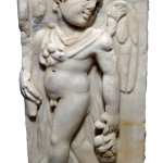 Provincial Roman marble frieze depicting nude Eros. Ancient Resource image.