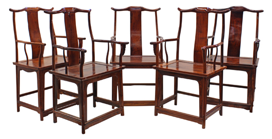 This lot of five Chinese hardwood and huanghuali official’s hat armchairs achieved the event’s highest price of $143,800 against its high estimate of $40,000. Clars Auction Gallery image.