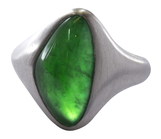 This fine jadeite and platinum ring which featured one free-form jadeite cabochon measuring approximately 15.9 x 8.47 x 5.20mm sold for $29,000. Clars Auction Gallery image.