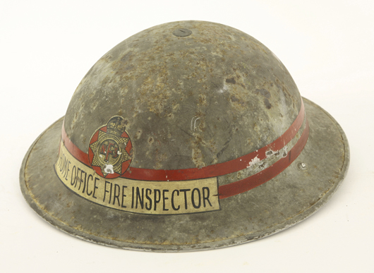 Scarce World War II tin fire helmet with NFS transfer, 'Home Office Fire Inspector,' complete with chin strap and liner, helmet marked ZA II HBH 1938. Estimate: £150-200. Sworders Fine Art Auctioneers.