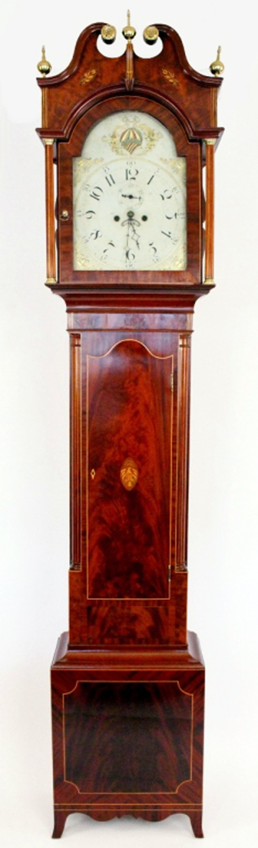 Federal eagle-inlaid and figured mahogany tall case clock, circa 1800, attributed to Matthew Egerton. Price realized: $23,500. Ahlers & Ogletree image.