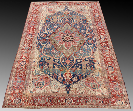 Hand-woven, palace-size (11 feet by 17 feet 8 inches) Persian serapi carpet, floral on a cream background. Price realized: $12,000. Ahlers & Ogletree image.