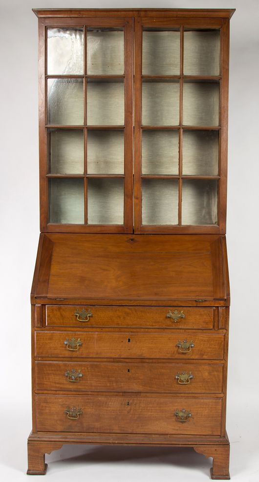 A fine Virginia figured walnut Chippendale desk with a slightly later bookcase top, realized $23,000. Jeffrey S. Evans & Associates image.