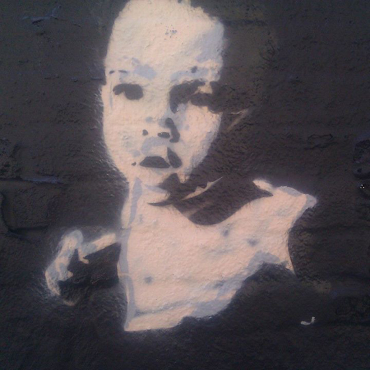 Baby, artist unknown, Mechanics Alley, New York City. Photo by Ilana Novick.