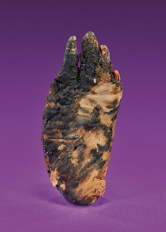 Mummified female hand, Ptolemaic period. Origin: Valley of the Queens, Thebes, Egypt. Estimate: $3,000-$4,000. I.M. Chait image