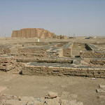 The ruins of Ur, with the Ziggurat of Ur visible in the background. Image by M.Lubinski from Iraq,USA. This file is licensed under the Attribution-ShareAlike 2.0 Generic license.