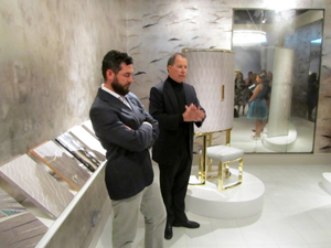 Viscount Linley (right) and his chief designer Michael Noah on the Linley stand at Masterpiece London. Image Auction Central News.