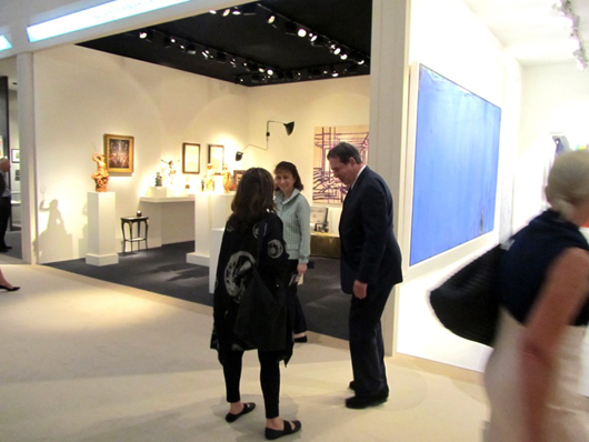Collector Charles Saatchi stops to chat to friends at Masterpiece  London. Image Auction Central News.