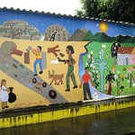 A mural in the town of Perquin, El Salvador, former 'guerrilla capital' and now a tourist destination. Photo by jbmurray, sourced through Wikimedia Commons.