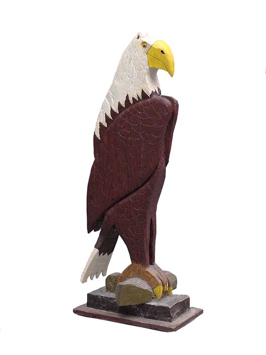 Sometimes you get a bargain at an auction. This carved wooden eagle sold in March 2014 for $47 at Copake auction in Copake, New York.