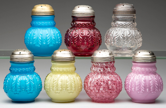 Sugar shakers from a large collection of Northwood Leaf Mold pattern. Jeffrey S. Evans image