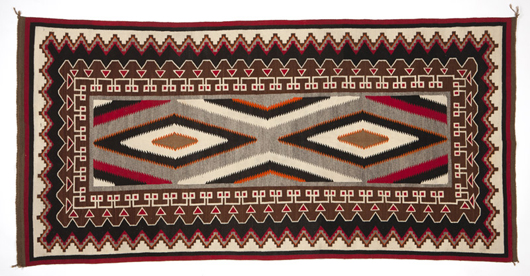 This Navajo woven Teec Nos Pos rug, executed in typically complex design and coloration, was sold to an online bidder to the tune of $3,382.50 (estimate: $1,500-$2,000). John Moran image