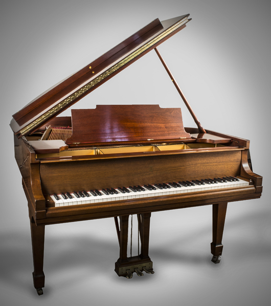 Steinway piano, serial no. 236473, 1932, mahogany case with an associated bench, $7,800. Capo Auction image