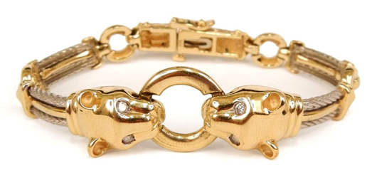 14K white and yellow gold bracelet, facing panthers with diamond eyes, est. 72.555ozt., est. $800-$1,200. Stephenson’s Auction image