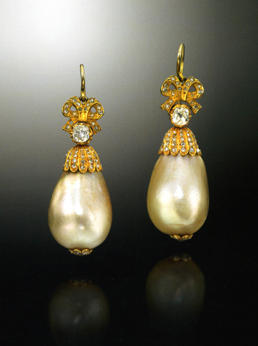 A pair of antique natural pearl drop earrings, suspended from diamond-set bows, possibly Russian, was purchased in 1938 as a bridegroom’s gift to his bride. It was valued then at £150. It sold at Woolley & Wallis on May 1 for £115,000 hammer.