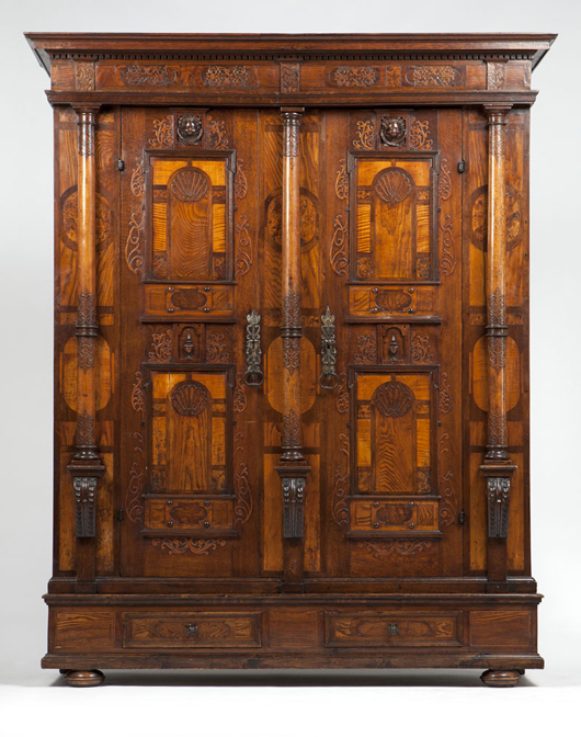 Estimated to bring $7000 to $10,000, this Continental armoire is richly veneered with oak, elm, and burl walnut, among other woods. John Moran image 