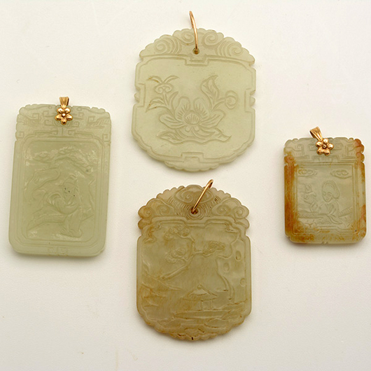 Four jade pendants sold for $21,240. Michaan’s Auctions image.
