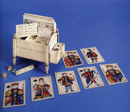 A good Napoleonic prisoner of war work bone games compendium with painted playing cards, dominoes and dice. Photo: Antique Collectors’ Club/Clive Lloyd.