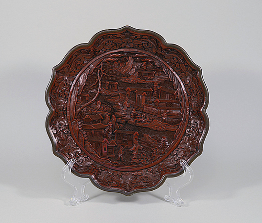 Lot 83 - Qianlong 1736-95 carved cinnabar lacquer dish. Start: $950 - estimate: $1,500. Mumbling Muse image.