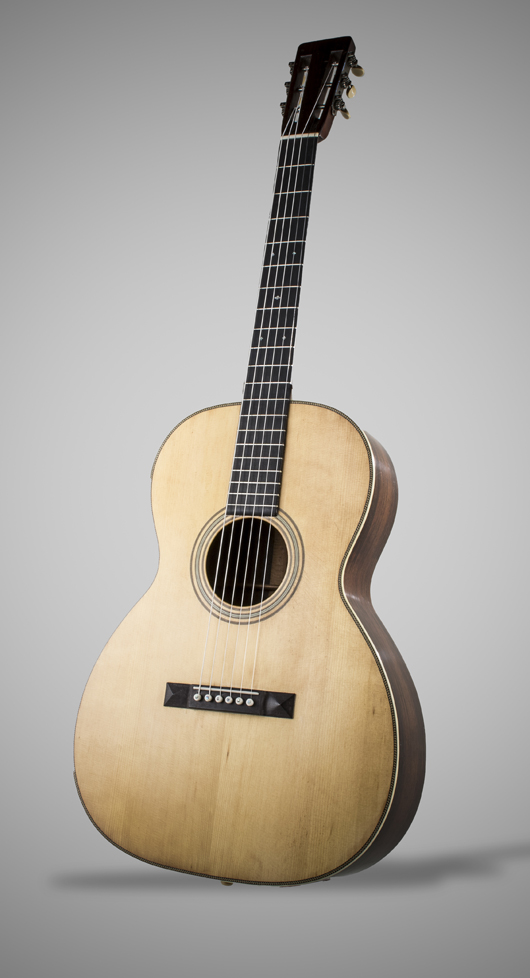 Martin 1926 00-28 Natural Acoustic Guitar, serial number 25243, with Brazilian rosewood back and sides. Estimate: $10,000-15,000. Capo Auction Fine Art and Antiques image.
