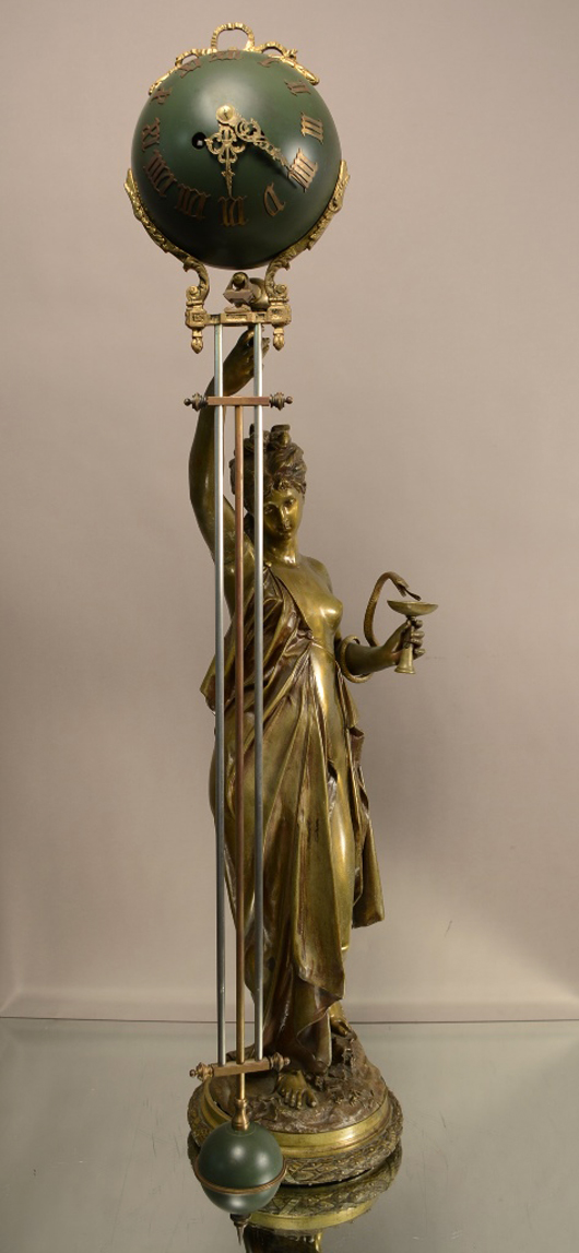 French Louis XV-style bronze mystery clock, circa 1880. Bruhns Auction Gallery image.