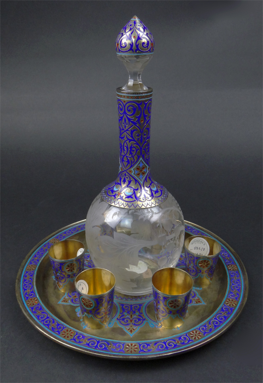 Early 20th century Russian Grachev Bros. silver, champlevé enamel and etched and cut crystal eight-piece cordial set. Price realized: $21,240. Kodner Galleries image.