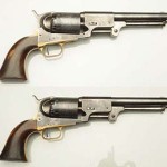 Top lot of the sale, a pair of 1857 Colt Walker Type 3 Dragoons with consecutive serial numbers, $54,000. Morphy Auctions image