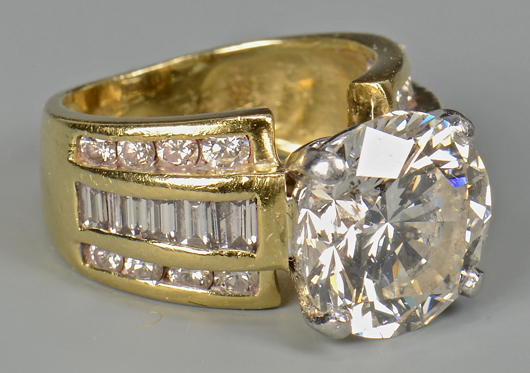 Jewelry had a strong showing, led by this 5.06 carat diamond and 18K gold ring at $54,450. Case Antiques Auction image.