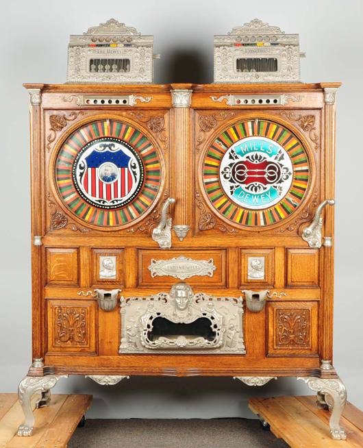 Mills Double Dewey upright slot machine, 5/25 cents, with original music. Est. $100,000-$125,000. Morphy Auctions image