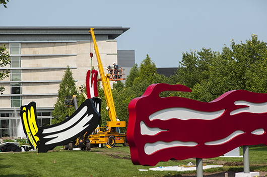 IMA staff installing Roy Lichtenstein’s 'Five Brushstrokes.' Indianapolis Museum of Art, Gift of the Roy Lichtenstein Foundation with additional support from the Robert L. and Marjorie J. Mann Fund, 2013.443A-E.4 © Roy Lichtenstein Foundation. 