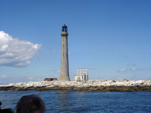 The current Boon Island lighthouse was constructed in 1855. It suffered extensive damage in a blizzard in 1978. Several stones that make up the brown granite tower were washed into the sea as were the keeper's house and outbuildings. Image courtesy of Wikimedia Commons.