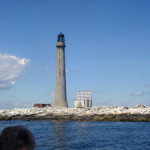 The current Boon Island lighthouse was constructed in 1855. It suffered extensive damage in a blizzard in 1978. Several stones that make up the brown granite tower were washed into the sea as were the keeper's house and outbuildings. Image courtesy of Wikimedia Commons.