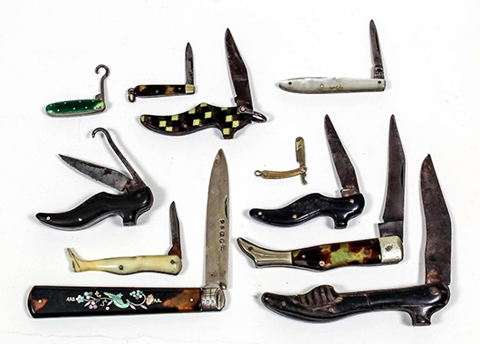 A group of Victorian novelty penknives, some with handles inlaid with mother of pearl, others shaped like legs or shoes. They sold for £340. Photo: The Canterbury Auction Galleries