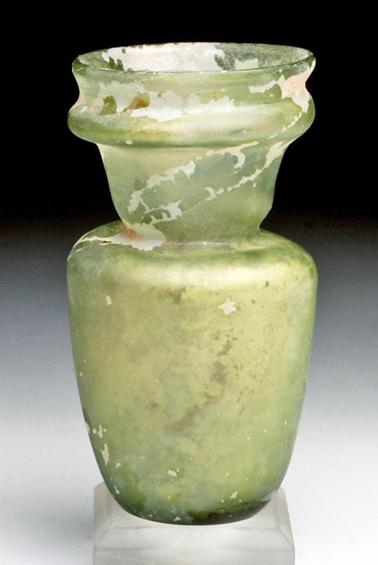 Lot 31b: Roman green glass jar, Roman Empire, ca. second to fourth centuries CE. Estimate: $600 - $1,000. Artemis Gallery image.