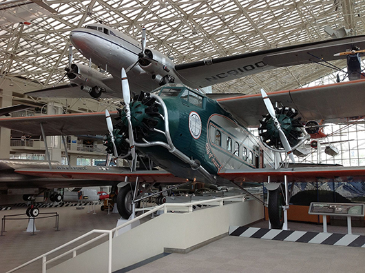 The Museum of Flight's 1929 Boeing Model 80A-1 (foreground), the only survivor of this model. It was recovered from a dump in Alaska in 1960. Image by Zendcee. This file is licensed under the Creative Commons Attribution-ShareAlike 3.0 Unported license.