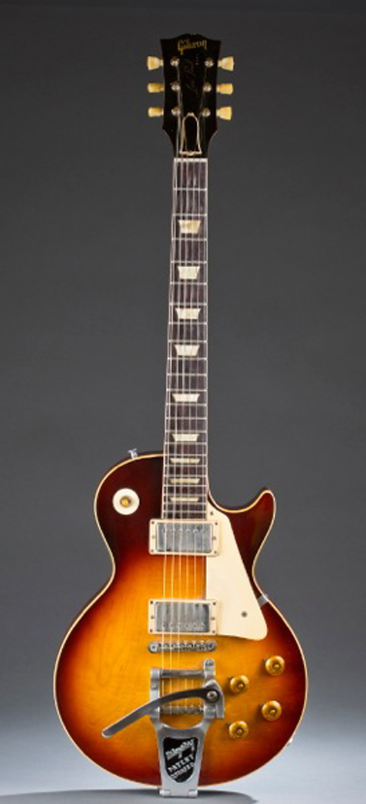 Rare 1960 Les Paul Sunburst electric guitar with Bigsby vibrato device and pick guard. Est. $20,000-$30,000. Quinn’s Auction Gallery image.