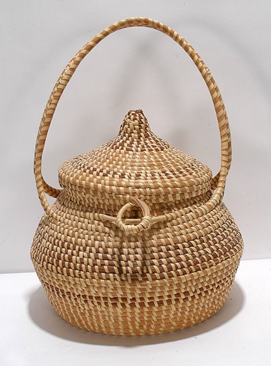 Sweetgrass basket with attached lid, 17 inches tall, circa 1990s. Image courtesy of LiveAuctioneers.com Archive and Slotin Folk Art.