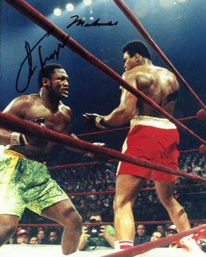 Joe Frazier (left) and Muhammad Ali in their first bout on March 8, 1971 at Madison Square Garden in New York. Image courtesy of LiveAuctioneers.com Archive and The Written Word Autographs.