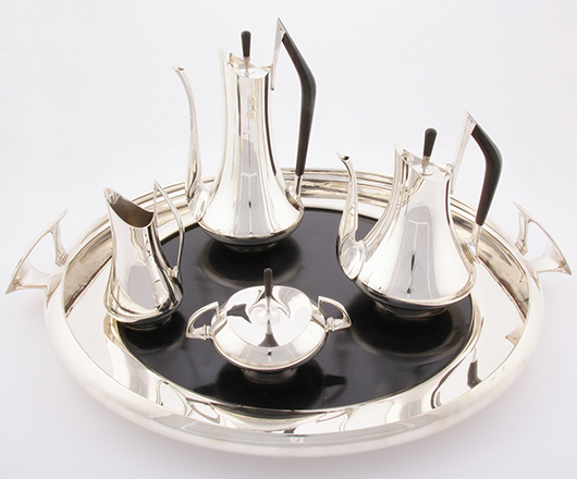 A ‘Circa 70’ silver and ebony four-piece tea and coffee service with tray, by American artist Donald Colflesh (b. 1932-), dates to circa 1958. Material Culture image