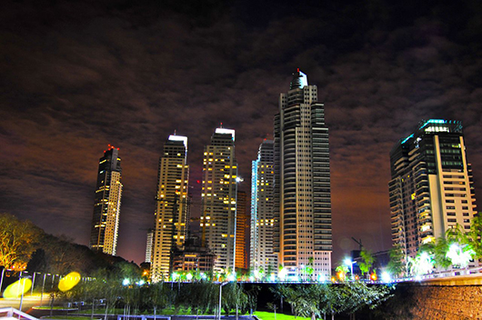  View of Buenos Aires' Puerto Madero neighborhood at night. Photo by Juan Ignacio Iglesias from Paso del Rey, Argentina. Licensed under Creative Commons Attribution 2.0 via Wikimedia Commons
