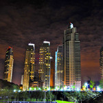 View of Buenos Aires' Puerto Madero neighborhood at night. Photo by Juan Ignacio Iglesias from Paso del Rey, Argentina. Licensed under Creative Commons Attribution 2.0 via Wikimedia Commons