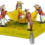 When this toy is wound, four Chinese men in colorful hats wave the canopy to toss the child. It recalls the Boxer Rebellion in China in 1900. The 5-inch-high toy sold for $14,800 at a Bertoia auction in Vineland, N.J., in 2013.