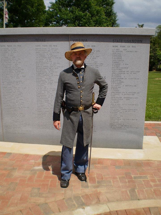 Greg Griffin, a local attorney,  portraying Gen. Andrew Jackson Hansell, leads a walking tour at the memorial in Marietta. Griffin resides in Gen. Hansell’s house known as Tranquilla. Image courtesy of Keep Marietta Beautiful.