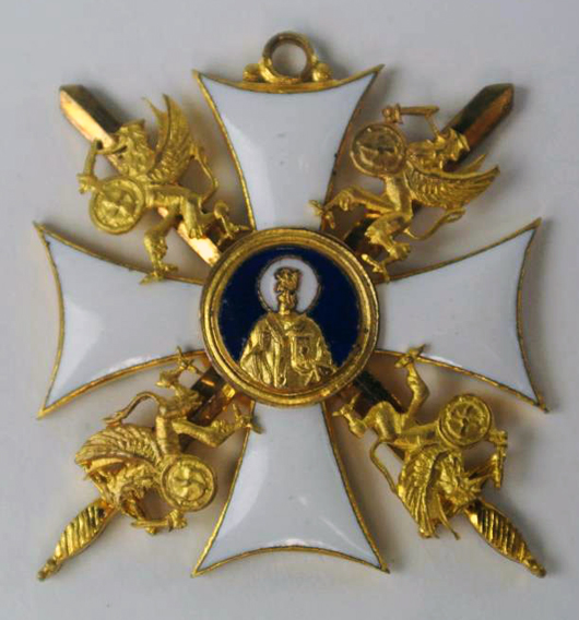 From a fabulous collection of antique badges and medals, a Russian Cross honor badge marked ‘1914 – 1917’ on verso, enameled metal. Est. $600-$800. Don Presley image