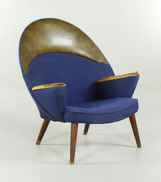 This rare Hans Wegner upholstered Peacock Chair set a new U.S. record for the Danish designer at $42,000. Kaminski image.