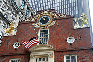 The Old State House in Boston, with the lion statue at the upper left. Image by Ingfbruno. This file is licensed under the Creative Commons Attribution-ShareAlike 3.0 Unported license.