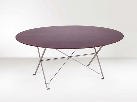 Luigi Caccia Dominioni table, walnut and steel, produced by Azucena, circa 1950, 70 inches x 30.3 inches x 51.2 inches. Estimate: €5,000-6,000. Nova Ars image.